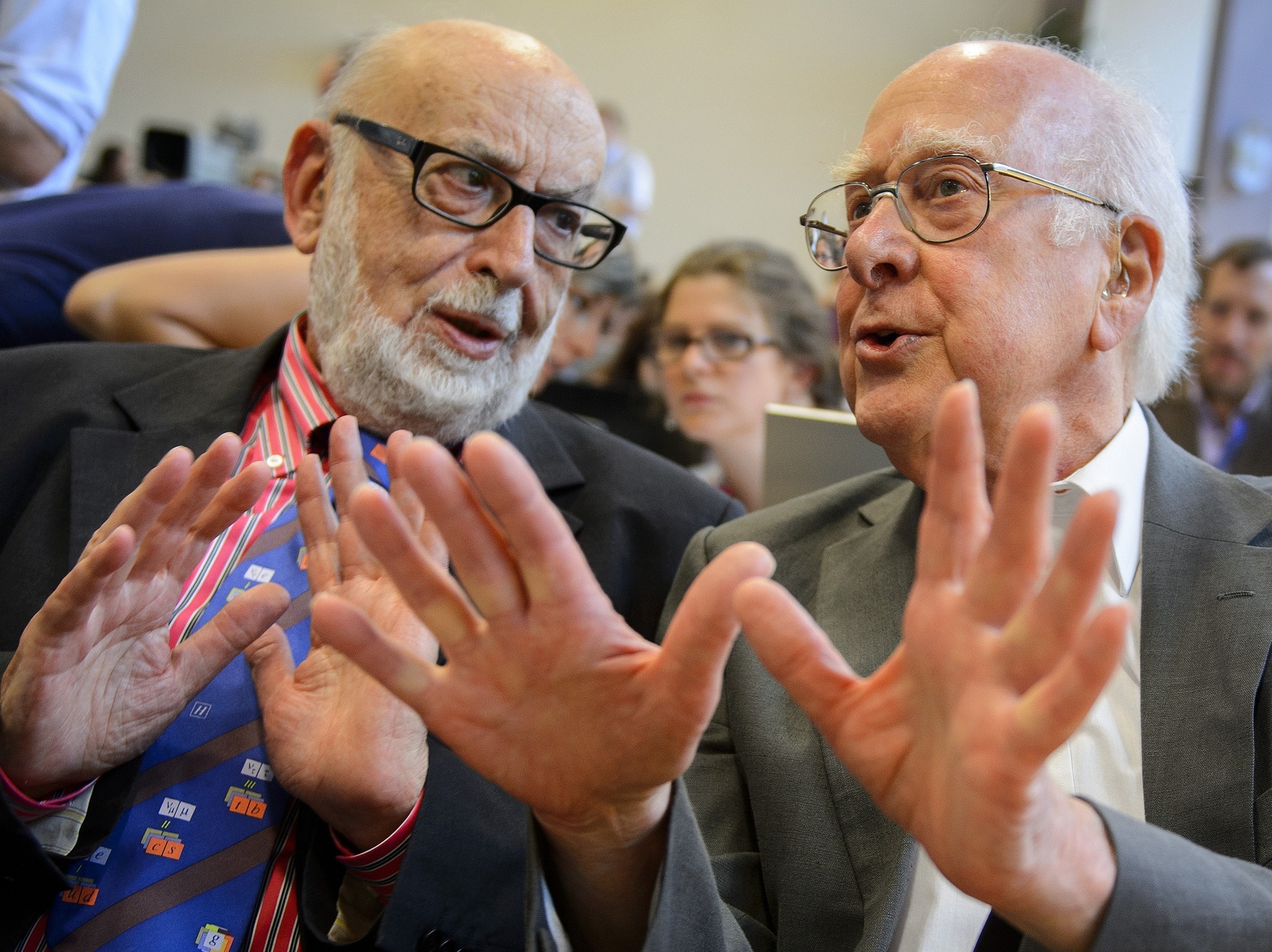 Francois Englert (left) and Peter Higgs discuss their discovery during a press conference at CERN offices. AFP/Getty Images 