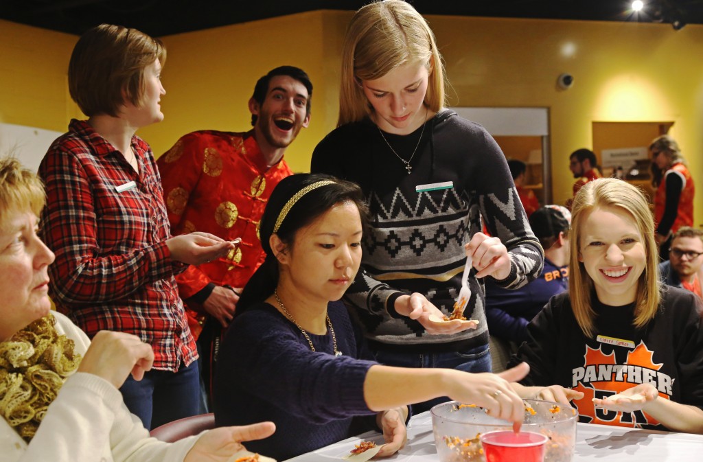 Students making dumplings together. Photo by Jack Wang