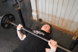 Jacob Siefken struggling with the bench-press.