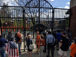 Image from USA today sports. Some die hard Baltimore fans watch from outside the locked gate
