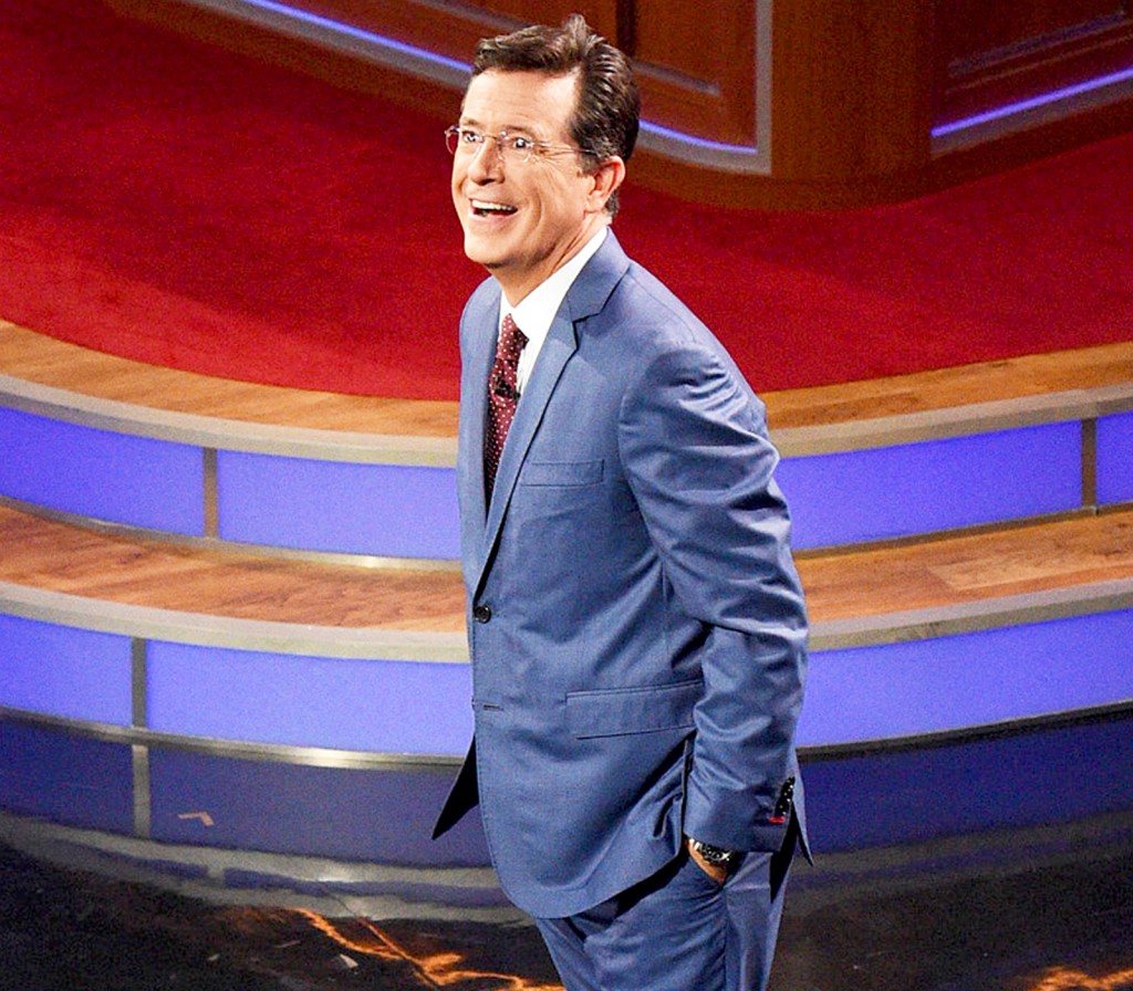 Colbert looking at the crowd in amazement on his first show via usmagazine.com
