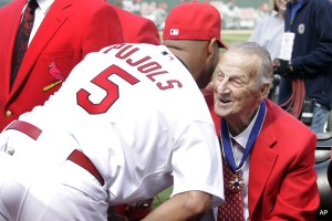 Pujols giving a hug to Stan The Man. Image from sports.yahoo.com