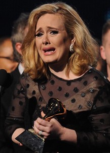 Adele crying at the 54th Grammy Awards.