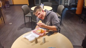 Student Andrew Anderson relishes his quesadilla. Photo by Ben Casey. 
