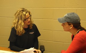 Kelli Pryor meets with a student to discuss their resume.