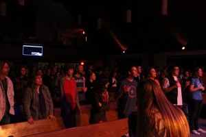 Students sing in worship