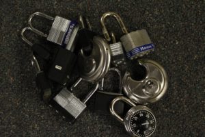 A pile of various padlocks